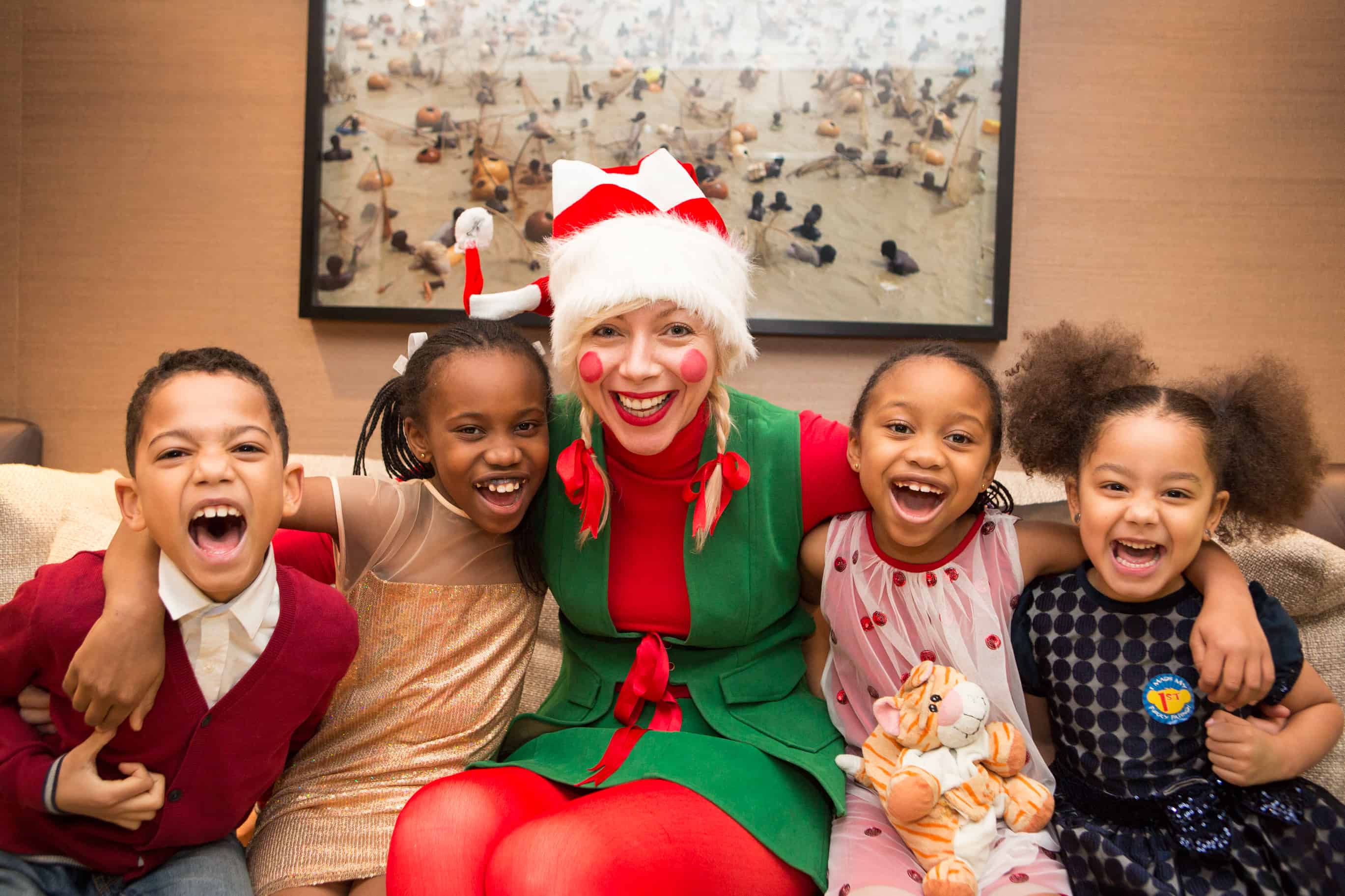 Santa visiting a family at home